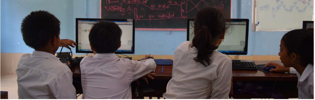 Middle school students on computers