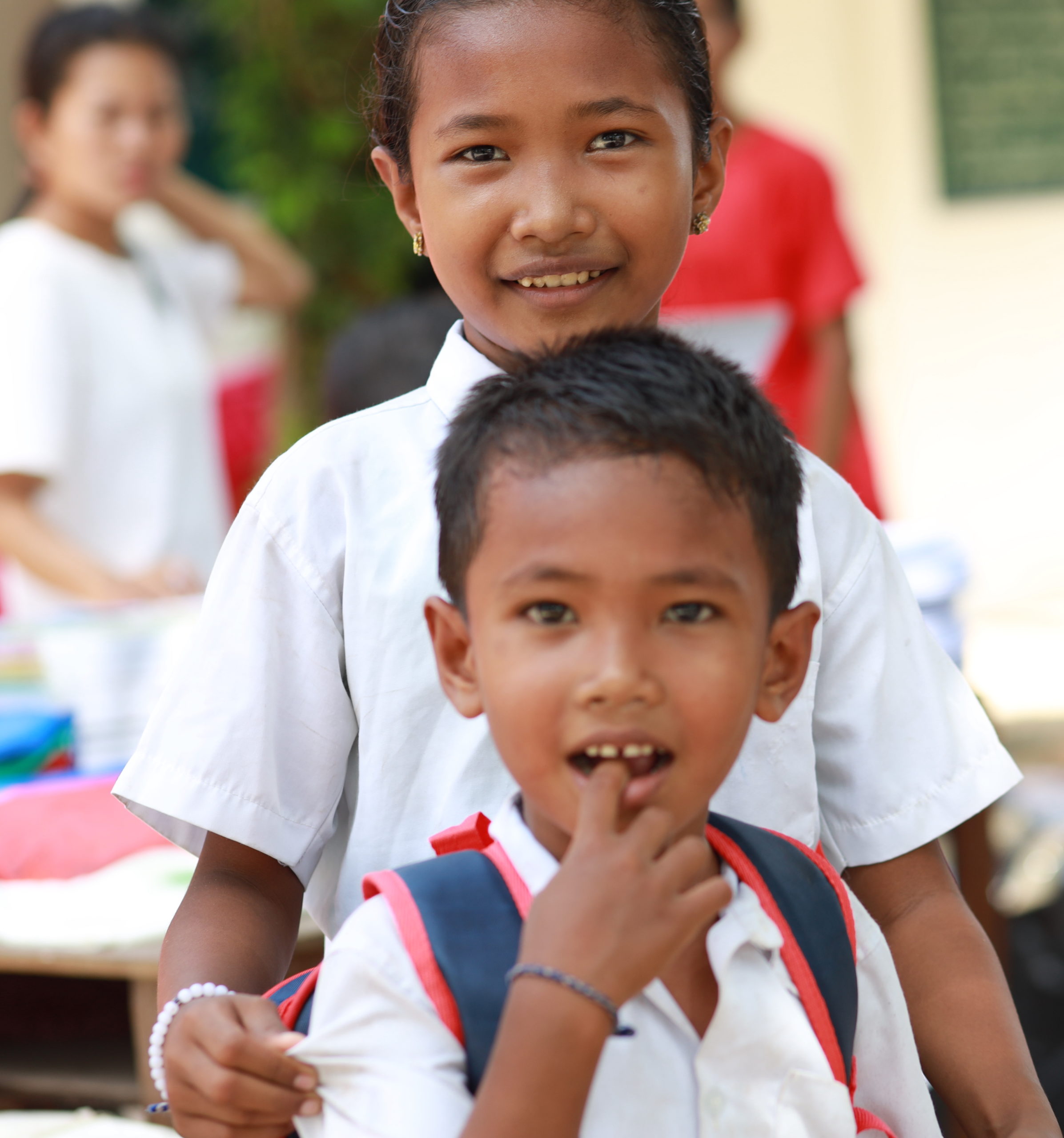 Tchey brother and sister on enrolment day
